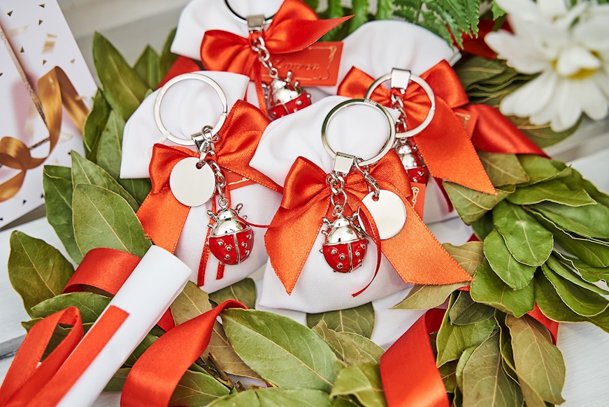 Bomboniera Laurea Portachiavi coccinella rossa con sacchetto portaconfetti Selezione Zanolli