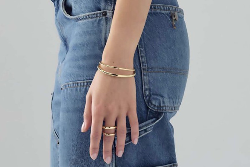 Bracciale rigido Line in bronzo dorato Unoaerre