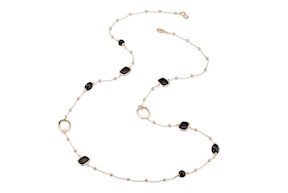 Collana Isabelle ottone dorato con onice e cristalli occhio di gatto nero Sovrani