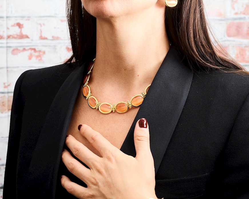 Collana ottone finitura oro con occhio di gatto arancio Sovrani