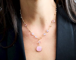 Collana Simonne ottone finitura oro con occhio di gatto rosa/viola Sovrani