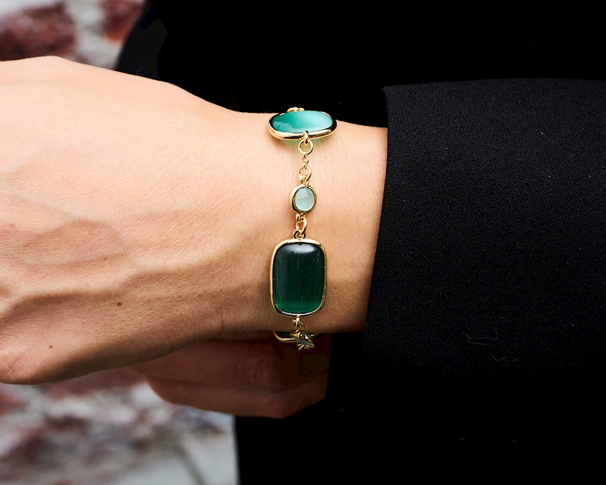 Bracciale Lea ottone finitura oro con occhio di gatto verde/verde acqua Sovrani