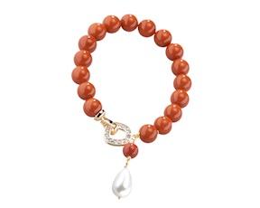 Bracciale ottone finitura oro con pasta di corallo perla e zirconi Sovrani