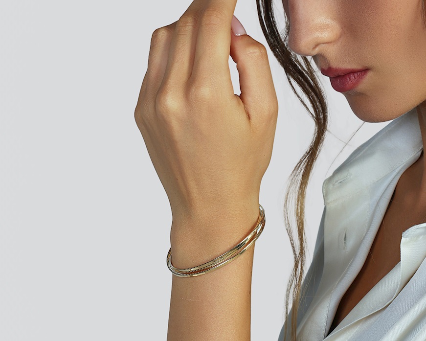 Bracciale argento dorato a tre fasce zigrinate Unoaerre