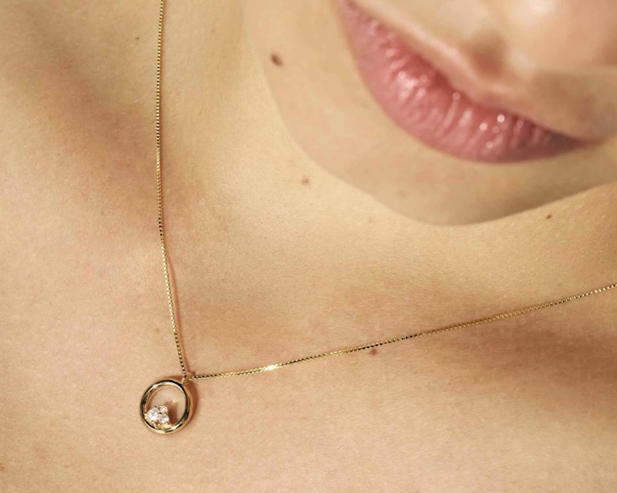 Collana Dreams Beats argento dorato tondo con zirconi Nomination