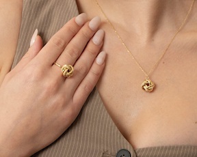 Anello Oro 9 Kt con nodo lucido e zigrinato Unoaerre