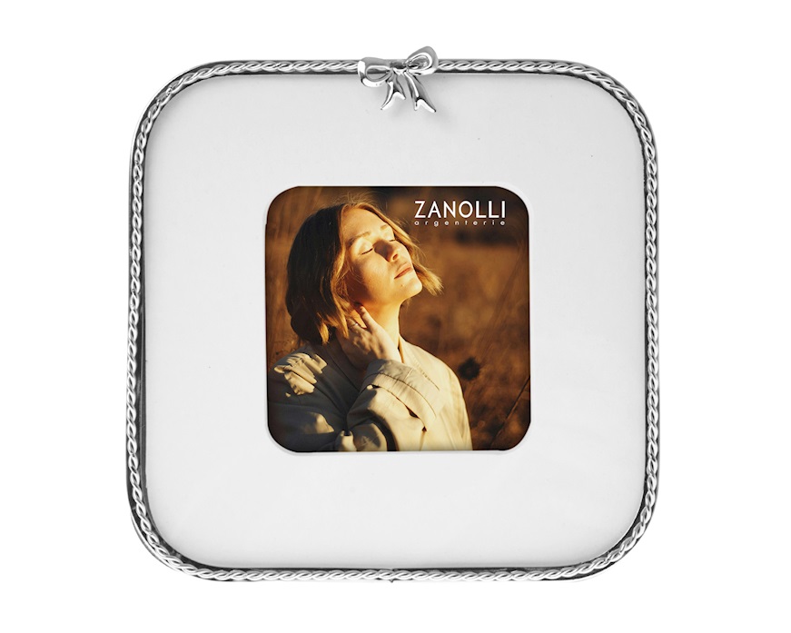 Cornice in metallo lucido con fiocco Selezione Zanolli