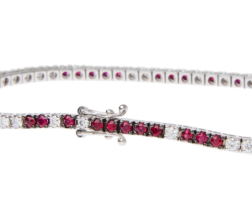 Bracciale tennis oro 750‰ e diamanti ct. 0.85 e rubini ct. 1.65 Davite & Delucchi