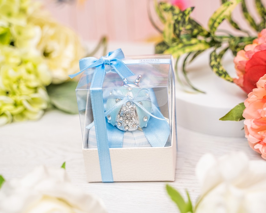 Bomboniera Battesimo Coccinella azzurra con cristalli con sacchetto portaconfetti Selezione Zanolli