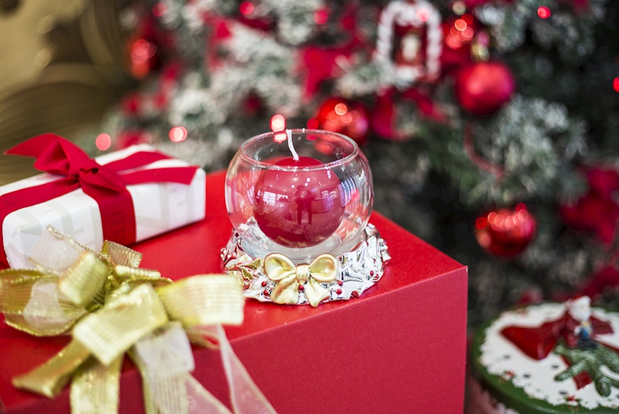 Idea regalo Natale Portacandele di Natale Fiocco Oro con candela e nastro Selezione Zanolli